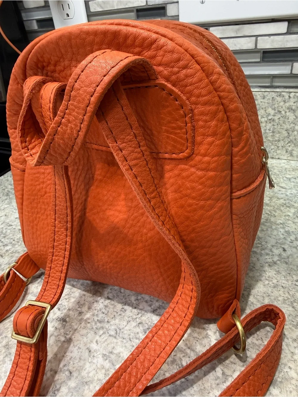 Portland Leather Orange Pebbled Leather Mini Backpack